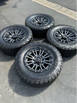 Brand New 20" Fuel Rebel Wheels For 8x165 (8x6.5) and 35" TOYO Open Country AT3s All Terrains