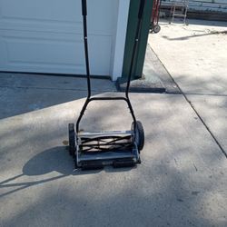 A Push Lawn Mower And Good Condition And Next