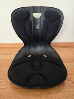 Curled back support chair