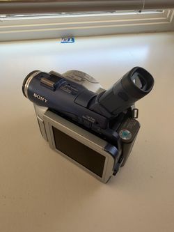 Sony Handycam DVD Camcorder (DCR-DVD series) – Bundle with Remote & Case Logic Bag