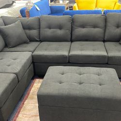 Reversible Sectional With Drop Cup Holder And Storage Ottoman