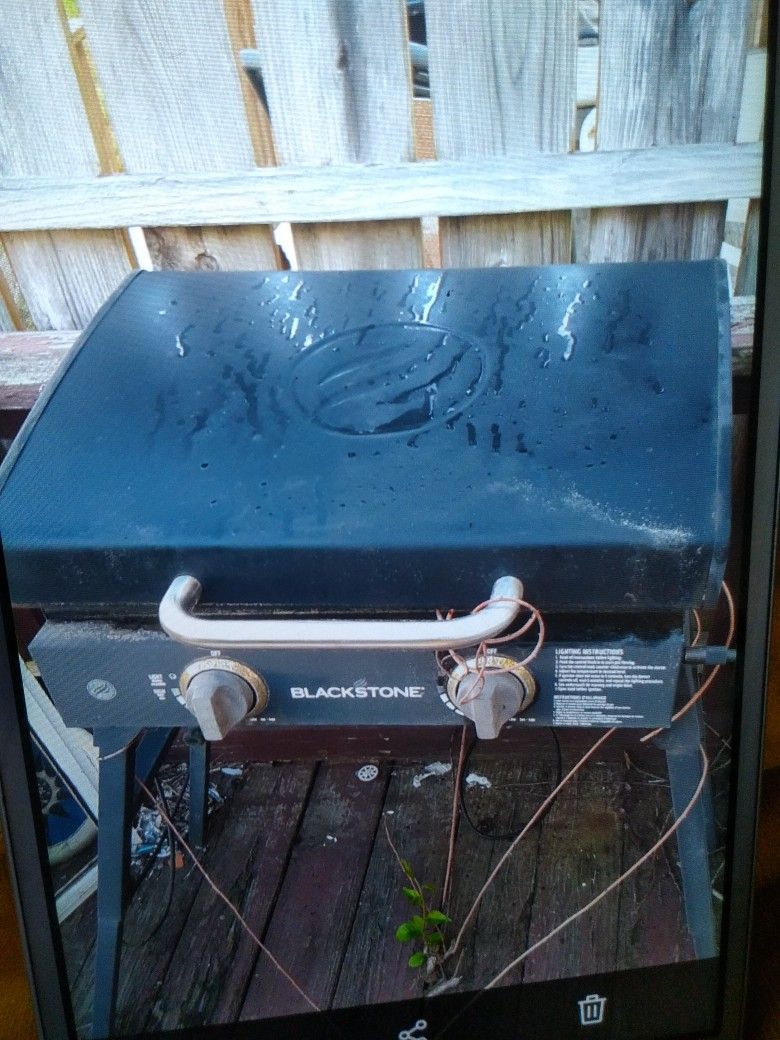 TWO BLACKSTONE GRILLS AND FULL SIZE TANK