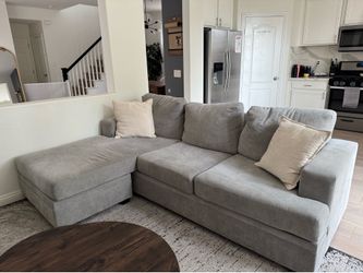 Gray sofa with reversible chaise