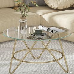 Round glass top coffee table brand new