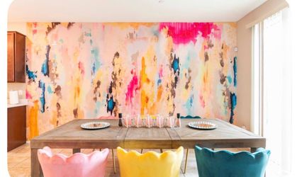 Large dining room table and colorful chairs