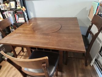 Dining table w/ lazy Susan and wine storage