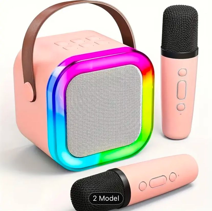 New In Box Speaker And 2 Microphones Bluetooth 