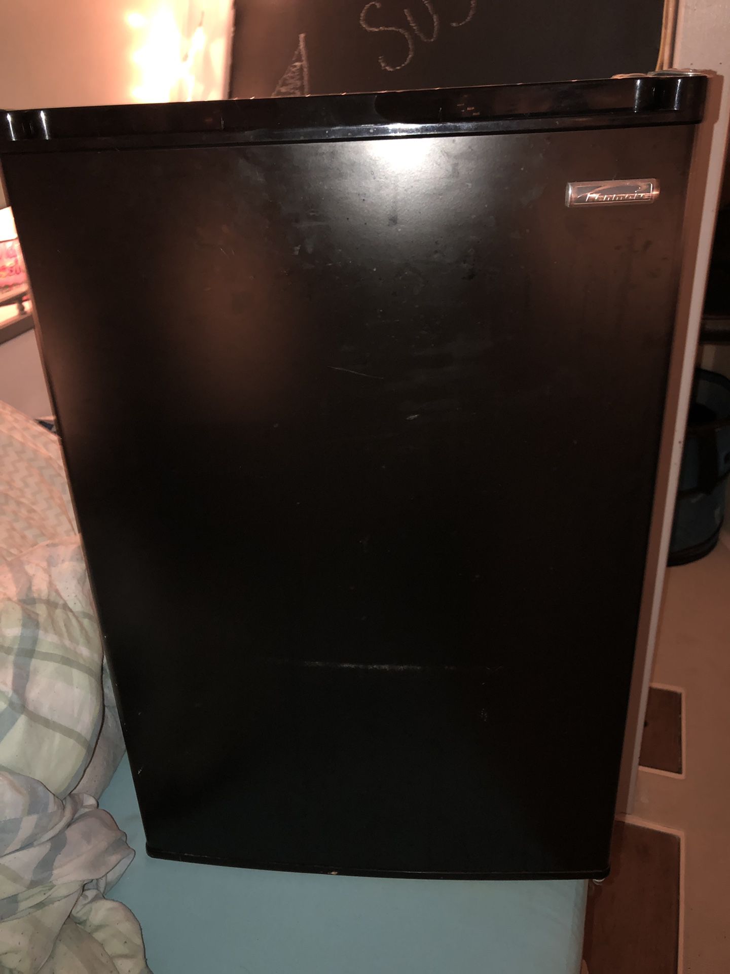 Kenmore Mini refrigerator with small freezer