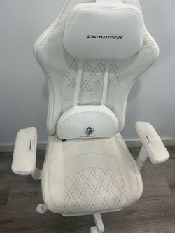 White gaming chair with massager
