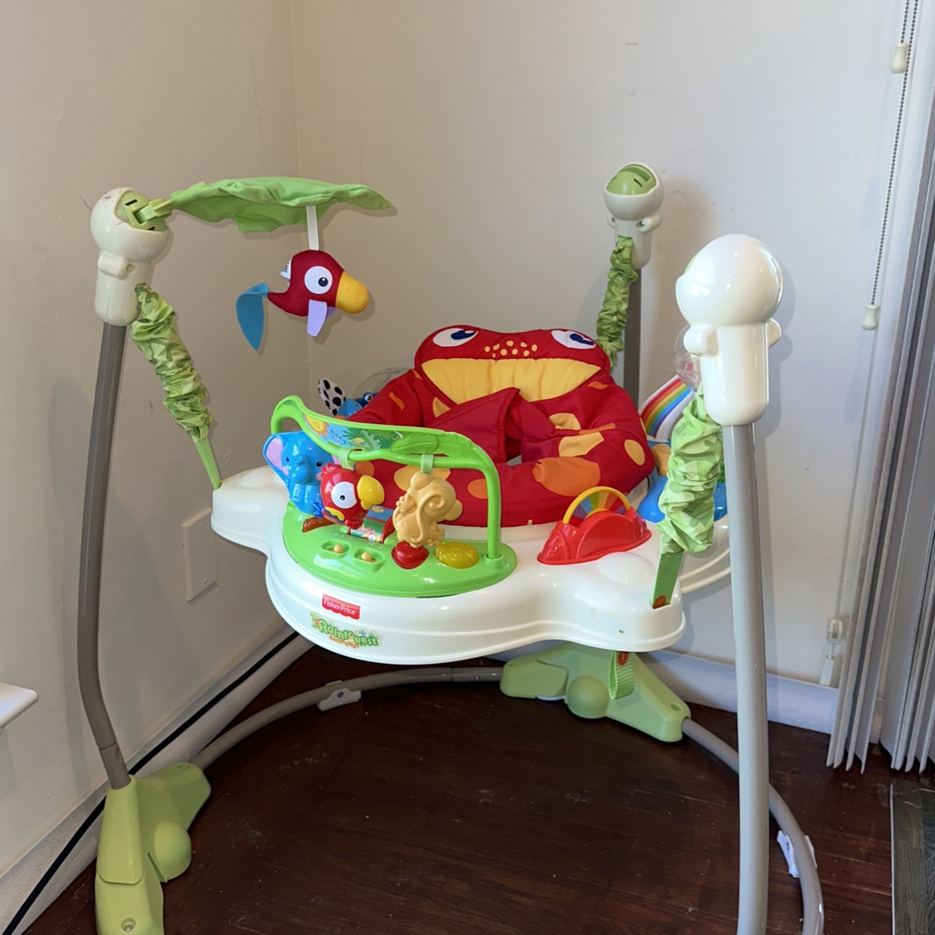 Fisher-Price Baby Bouncer Rainforest Jumperoo Activity Center with Music Lights Sounds and Developmental Toys