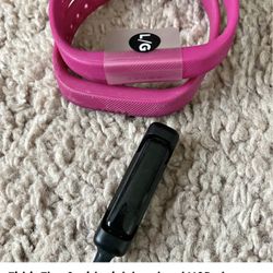 Fitbit Flex 2 with pink band and USB charger