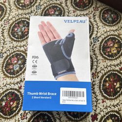 Left Thumb medium and wrist brace