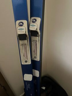 Skis, boots size 7, poles, cover bag