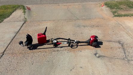 Troy -bilt Gas Trimmer with Attachment Capabilities