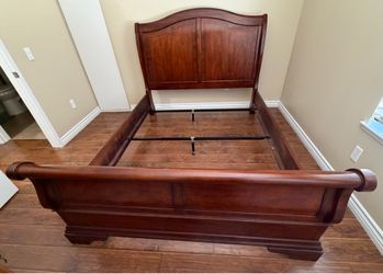 Mahogany Queen size sleigh bed.