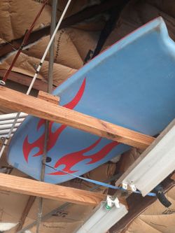 Blue Wakeboard with Red Flame Graphics