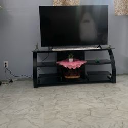 Black glass TV Stand. 