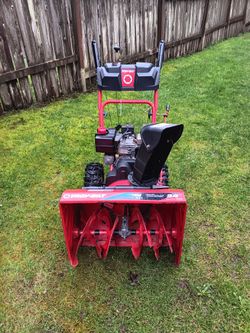 Troy-Bilt snow blower with electric start and pull start has 2 reverse and 6 forward used 4 times with 24" width runs great