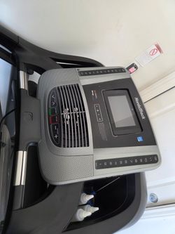 NordicTrack C 990 treadmill console featuring a 7-inch touchscreen