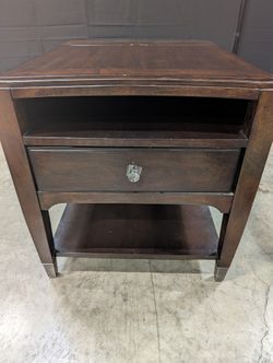 Functional Dark Wood Nightstand with Integrated Power Strip