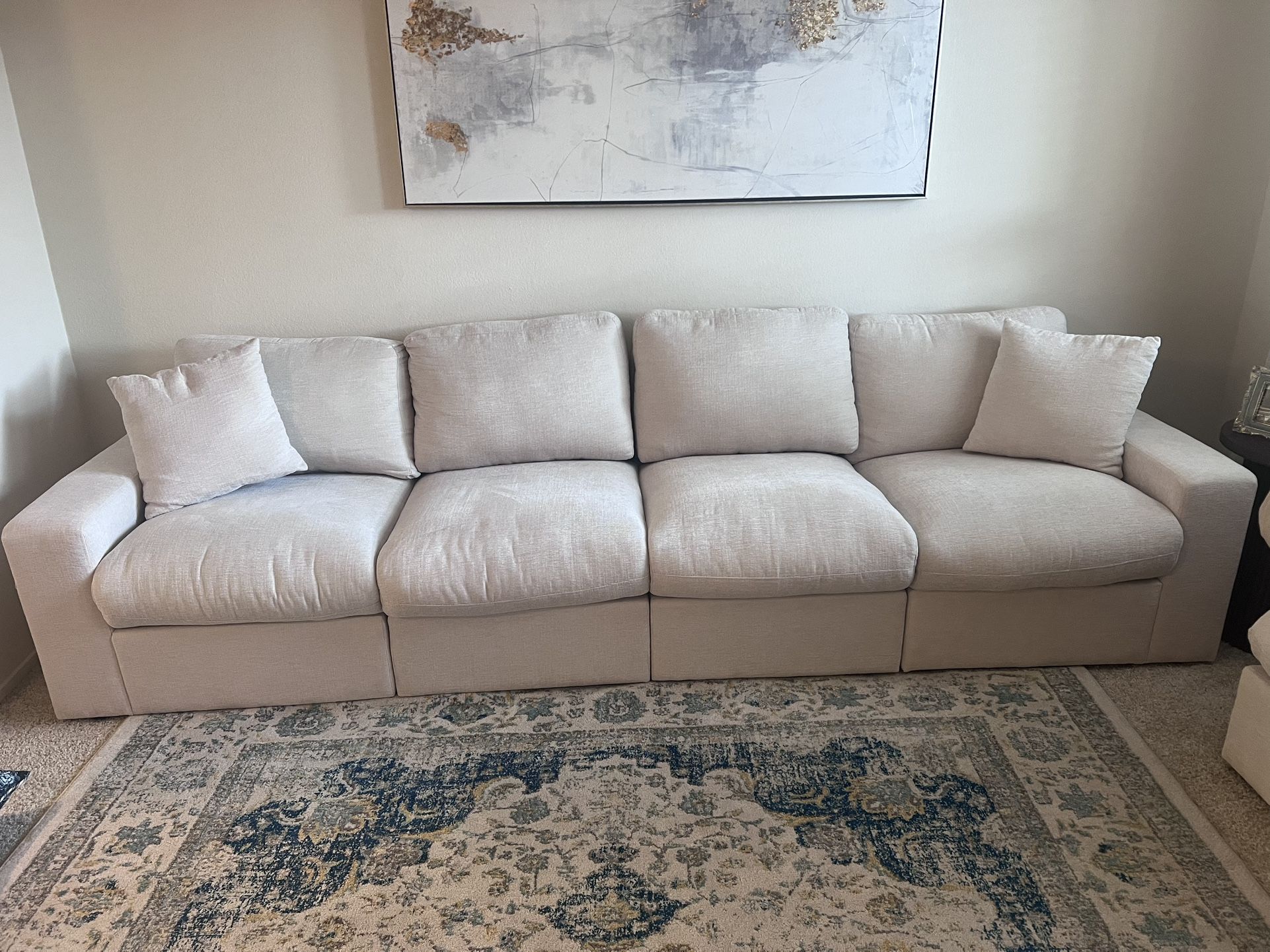 Four Seater Cream Couches With 2 Ottoman
