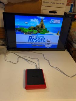Nintendo Wii Mini Red Console Only RVL-201  CONSOLE ONLY. No games or cords