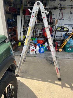 Gorilla ladder with scaffold attatchment