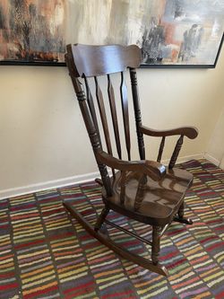 Vintage Dark Finish Windsor Style Spindle-Back Rocking Chair.