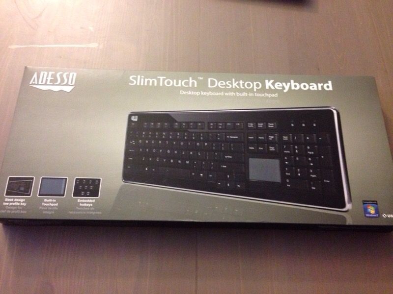 Brand new Keyboard with built-in touchpad
