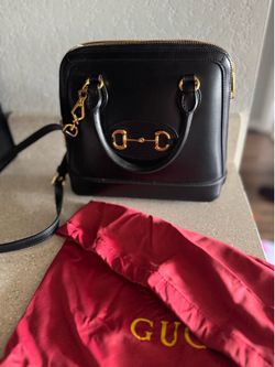 Gucci Black Crossbody Bag with Gold Accents