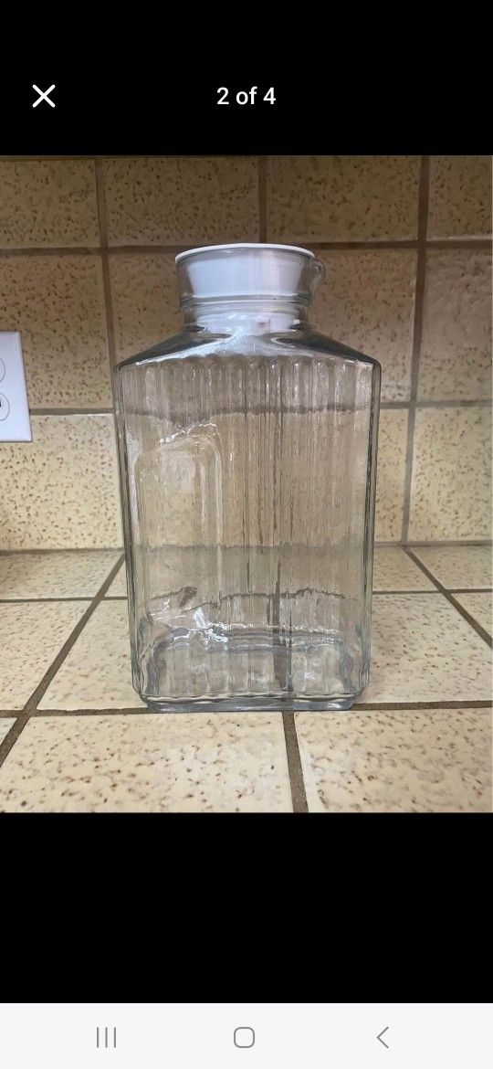 2 Glass Vtg Juice Jugs Glass