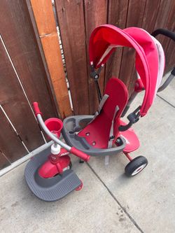 Dyson, red flyer, and exercise bike $20 each.