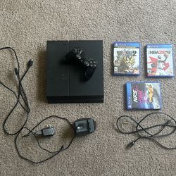 PlayStation 4 Console with Controller, Charger and Three Games
