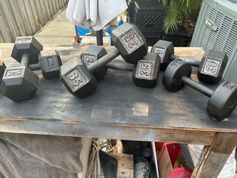 Solid iron hex dumbbells