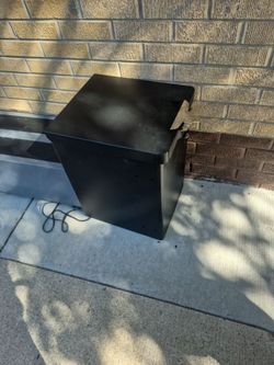 Metal storage compartment