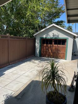 Solid wood and glass custom size garage door with hardware