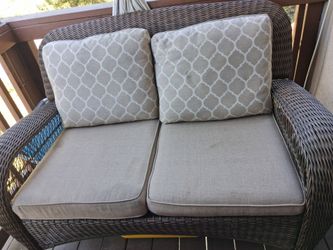 Hampton Bay outdoor wicker couch and matching metal and wicker table
