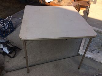 Fold up leather top 34 x 34 totally collapsible for picnics or any other kind of function