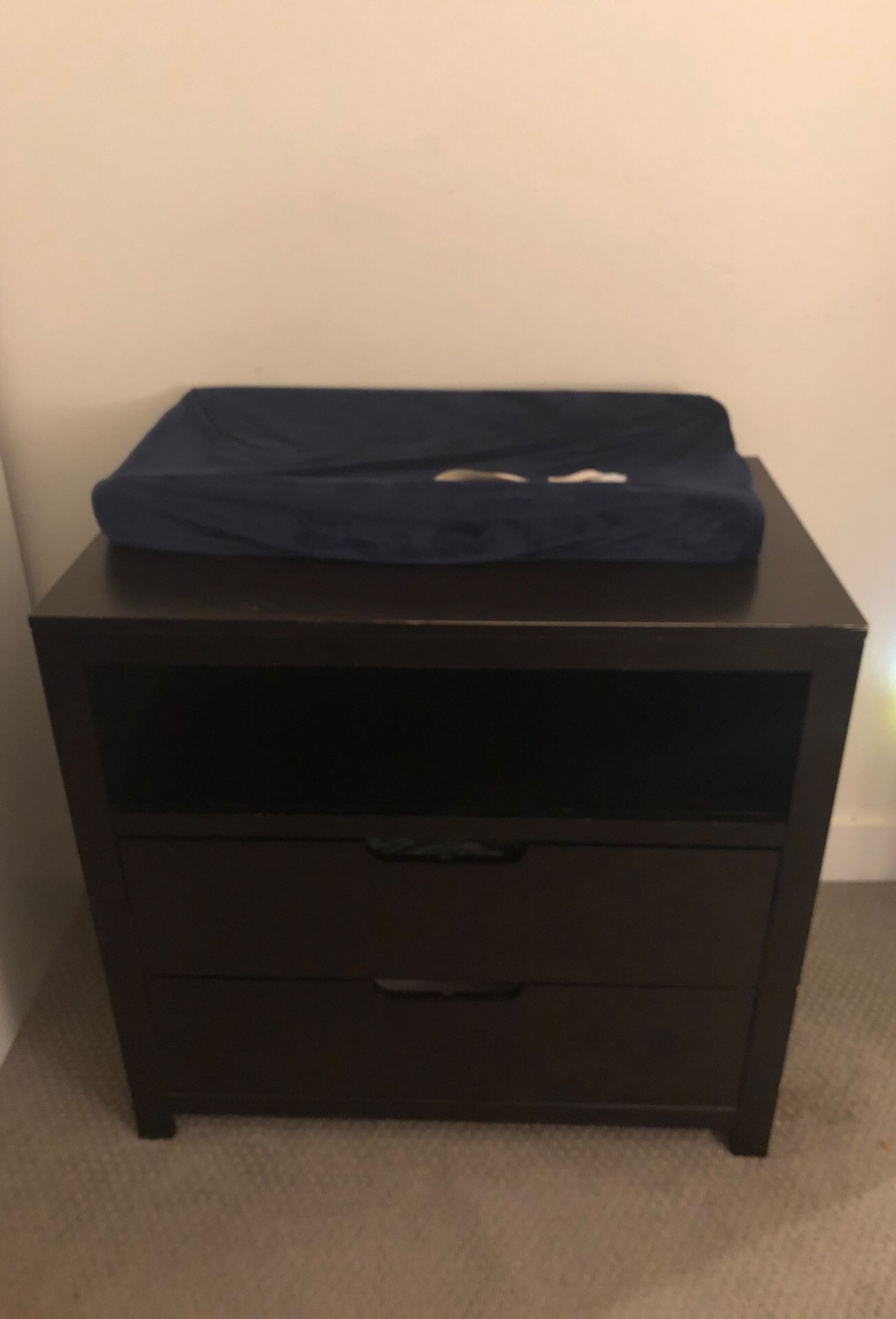 Changing table with changing pad dark wood