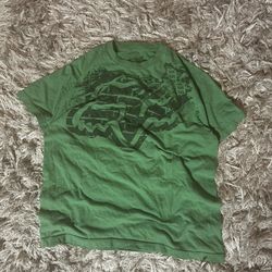 Fox Racing green short-sleeve T-shirt with bold front graphic. Tagged Medium