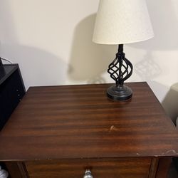 Two nightstands w lamps and tall bureau