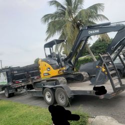 Excavator And Bob Cat