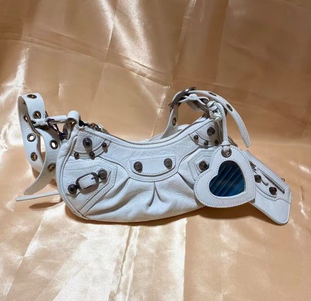 Balenciaga white fine-grain sheepskin with aged silver metal accents