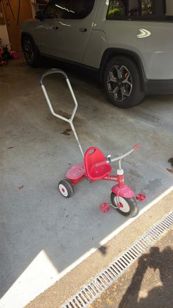 Kids push tricycle