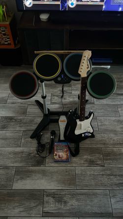 Rock Band 4 Bundle with Drums, Guitar and Mic+ Game