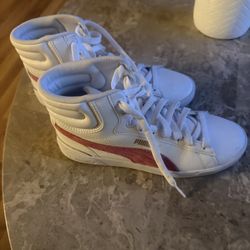Women Puma High tops Size 9.5
