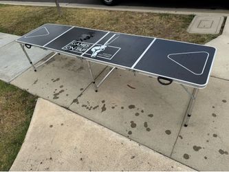 Folding beer pong table