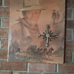 John Wayne Clock And 2 VHS Set And Red Ryder $120.00 Or Bo
