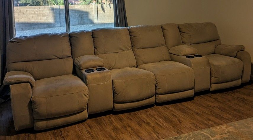 Four Piece Electric Reclining Sofa.