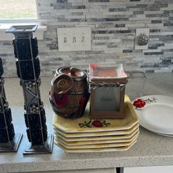 Eight dinner plates, two candleholders, two candle wax burners all for $15